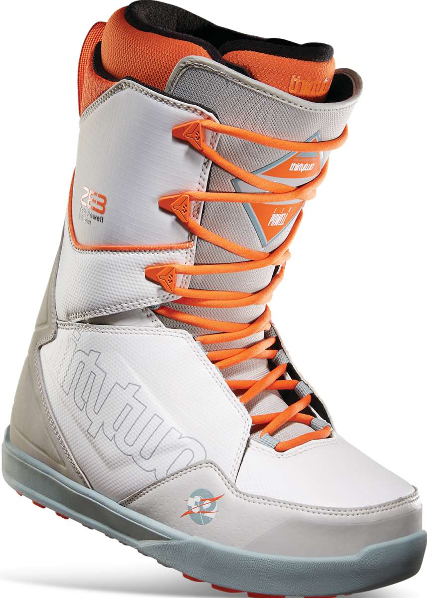 ThirtyTwo Lashed x Powell Snowboard Boot 2023 - A white snowboard boot with orange laces and a gray sole.