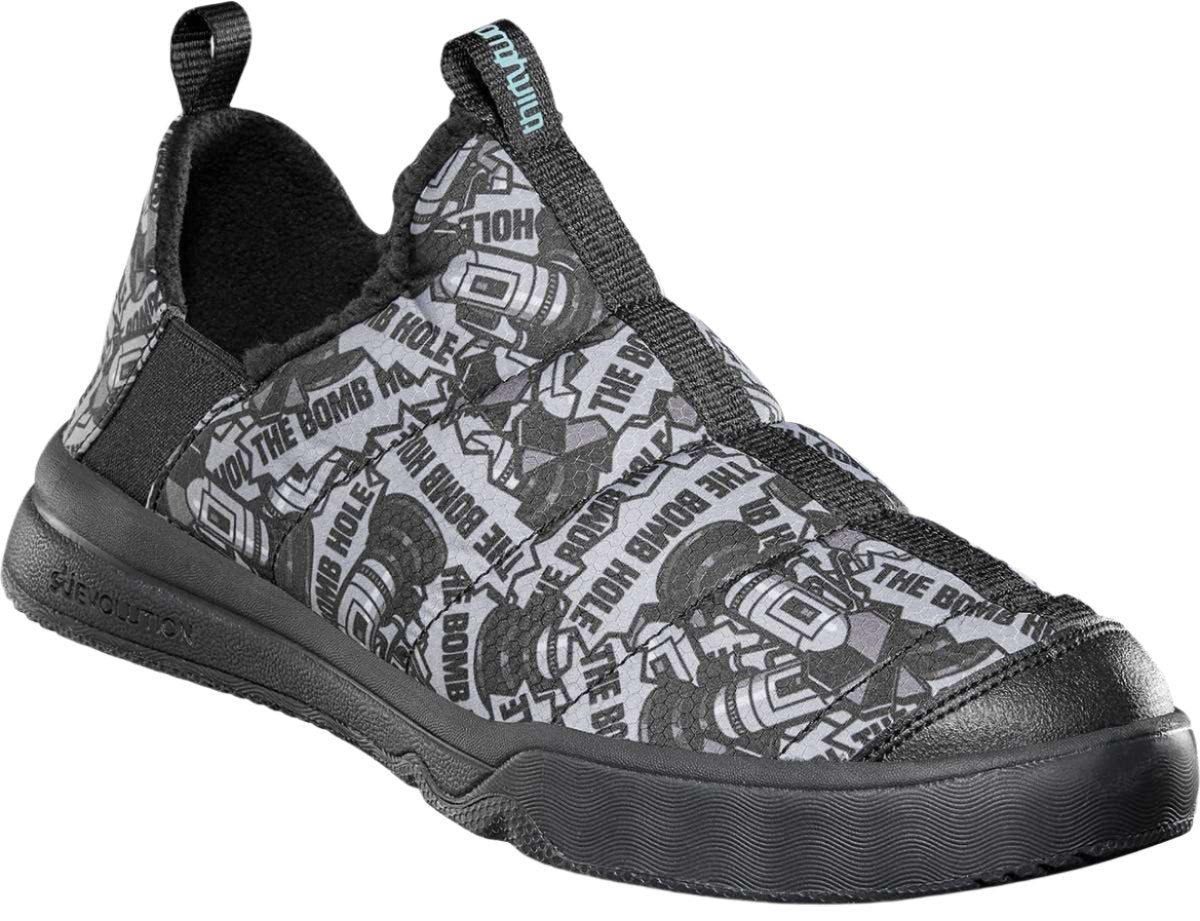 ThirtyTwo The Lounger X Bomb Hole Shoe 2024 - A gray shoe with a repeating pattern of white and black "THE BOMB HOLE" logos, featuring a cartoon bomb graphic.