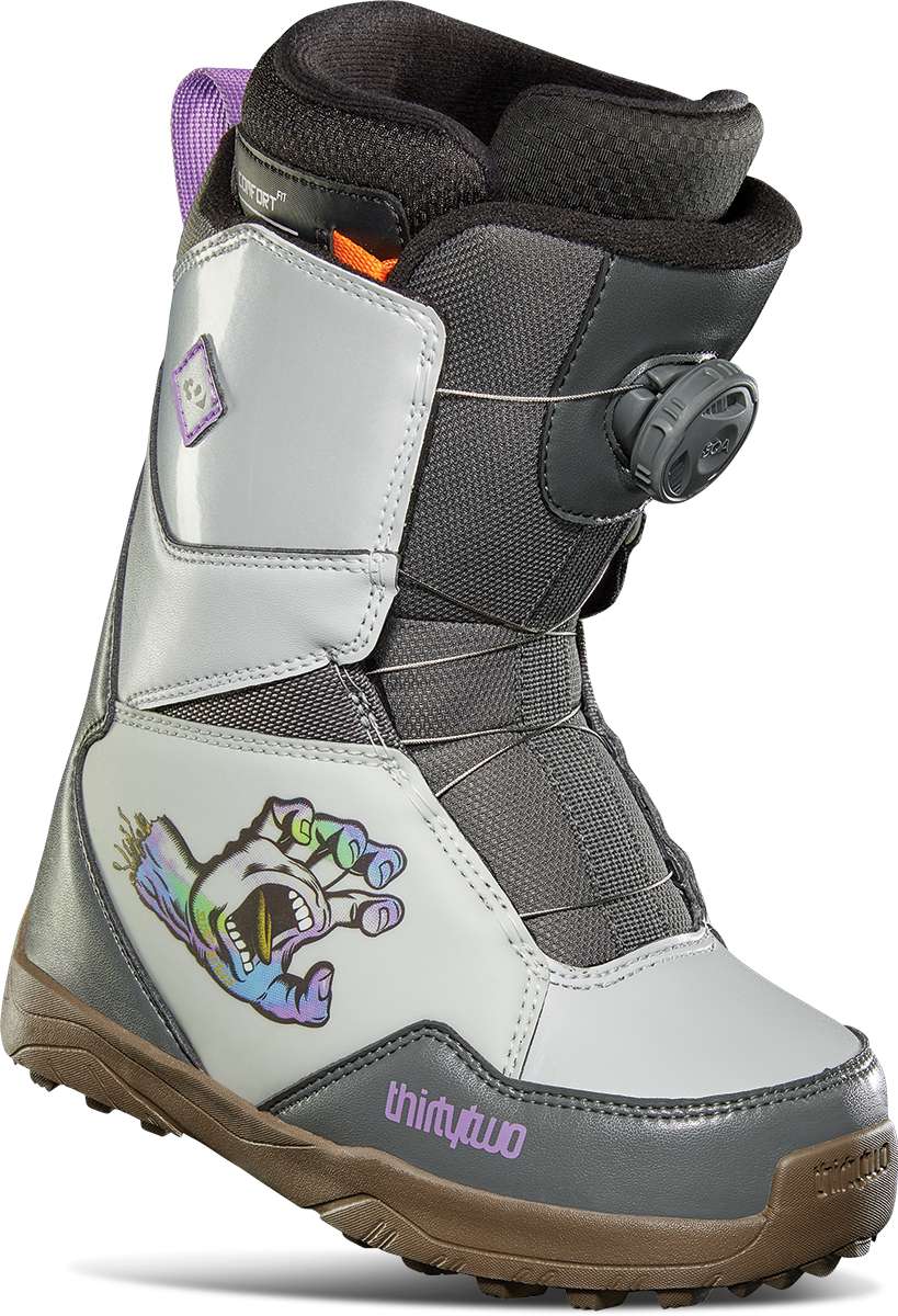 ThirtyTwo Junior's Lashed BOA x Santa Cruz Snowboard Boot 2024 - A gray snowboard boot with a purple logo on the side and a black strap with white text that reads "BOA".