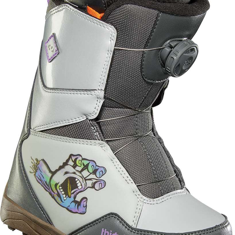 ThirtyTwo Junior's Lashed BOA x Santa Cruz Snowboard Boot 2024 - A gray snowboard boot with a purple logo on the side and a black strap with white text that reads "BOA".