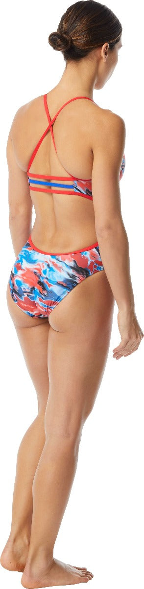 TYR Ladies' Synthesis Trinityfit Swimsuit - A red, white, and blue swimsuit with a floral pattern on the bottom half.
