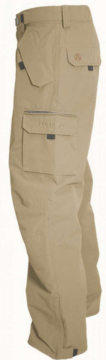 Turbine FDGB Shell Pant 2023 - Beige pants with a zippered pocket on the thigh and a logo patch on the upper left leg.