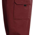 Turbine FDGB Shell Pant 2022 - A pair of dark brown snow pants with a zippered pocket on the thigh and adjustable Velcro straps at the waist.