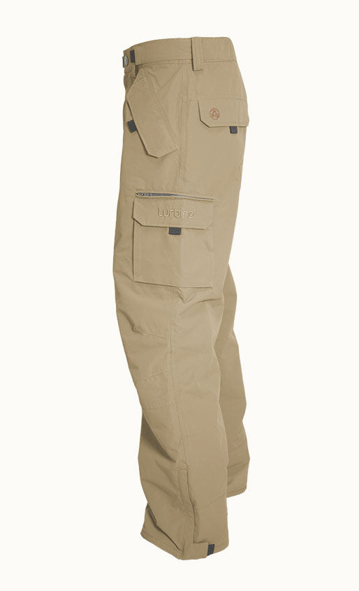 Turbine FDGB Shell Pant 2021 - A pair of khaki-colored pants with a zippered pocket on the thigh and a small logo patch near the waistband.