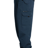 Turbine FDGB Shell Pant 2021 - A pair of dark blue snow pants with a zippered pocket on the thigh and a red logo patch near the waistband.