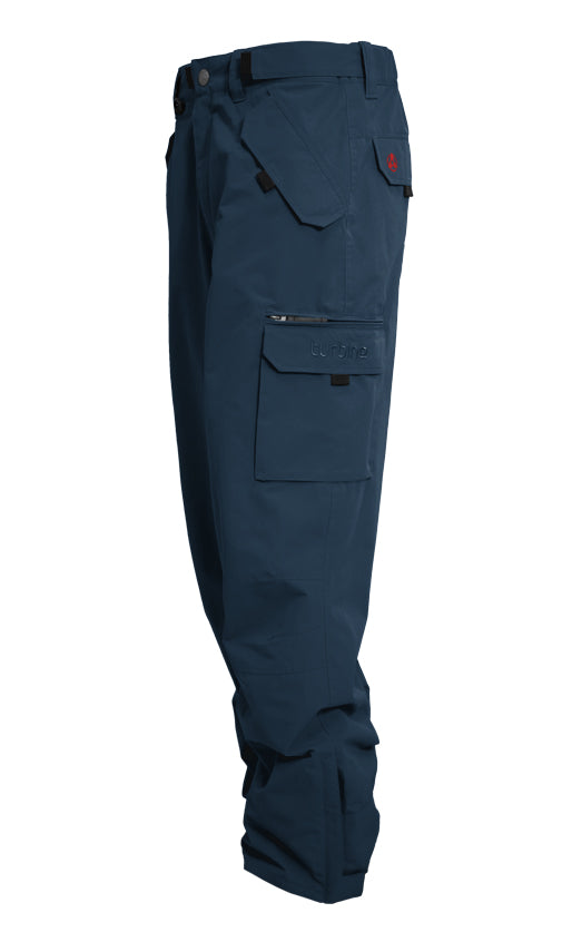 Turbine FDGB Shell Pant 2021 - A pair of dark blue snow pants with a zippered pocket on the thigh and a red logo patch near the waistband.