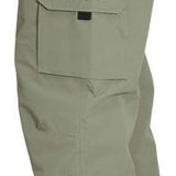 Turbine FDGB Shell Pants 2024 - Khaki pants with a red logo on the upper left pocket.