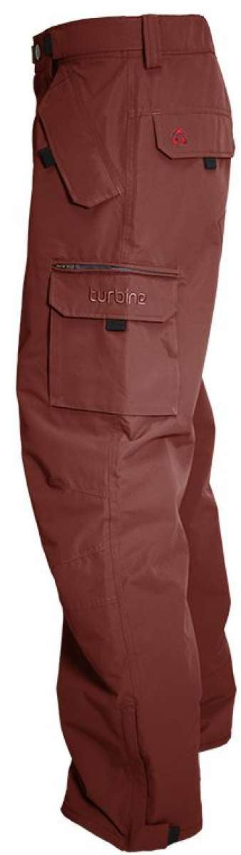 Turbine FDGB Shell Pants 2024 - A pair of brown pants with a zippered pocket on the thigh and a small red logo above it.