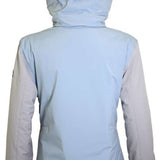 Turbine Girls Iris Insulated Jacket 2024 - A light blue jacket with a hood, featuring a small black zipper pull on the back of the hood.