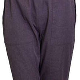 Turbine Ladies Longtrail Bib Pants 2024 - Dark-colored bib pants with a white logo on the left leg, featuring a belt and adjustable straps.