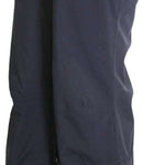 Turbine Women's Siren Insulated Pant - Black insulated ski pants with a zippered pocket on the right thigh and a small black logo near the bottom of the left leg.