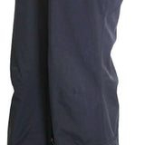 Turbine Women's Siren Shell Pant 2023 - Black pants with a shiny, smooth texture and a zippered pocket on the right thigh.