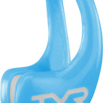 TYR Ergo Swim Nose Clip - A light blue plastic nose clip with a distinctive "TYR" logo in white on its front side, featuring an ergonomic design and a small lip at the top to fit snugly over the nose bridge.