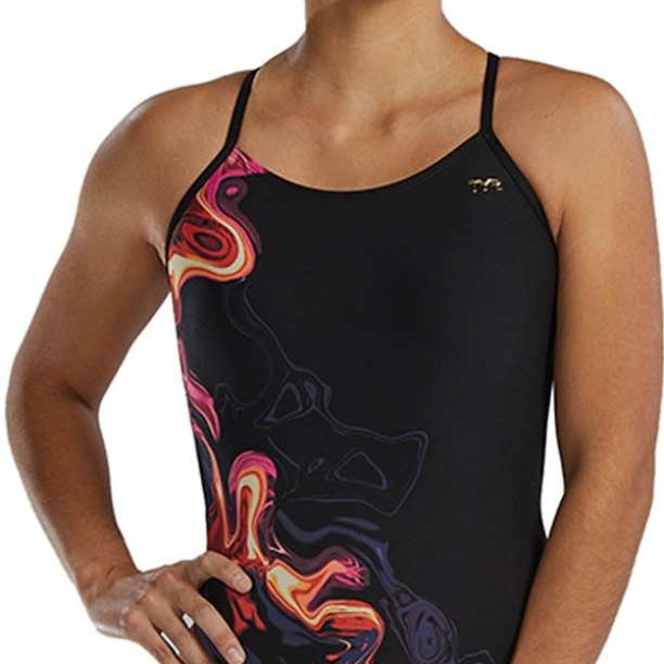 TYR Women's Cutoutfit Torch Swimsuit - A black swimsuit with a vibrant, abstract design featuring shades of orange and pink.