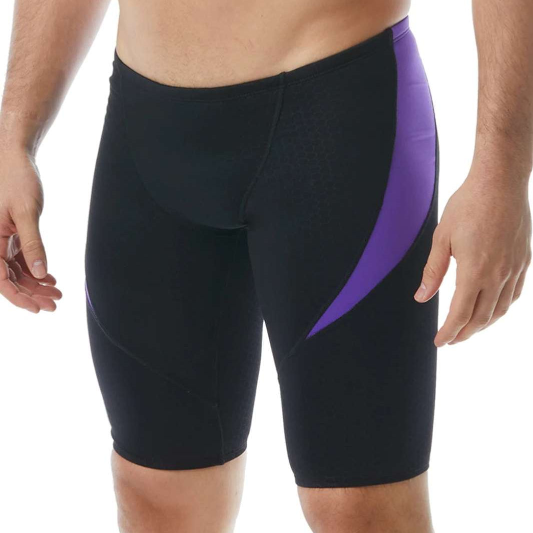 TYR Men's Hexa Curve Splice Jammer - A black jammer with a purple and white hexagon pattern on the left leg.