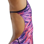 TYR Women's Cutoutfit Falcon Swimsuit - A women's swimsuit with a cut-out design on the side, featuring a pink and purple pattern.
