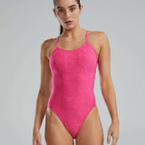 TYR Ladies Lapped Cutoutfit Suit - A women's one-piece swimsuit with a lapped cutout design on the hips, featuring a solid black color and thin straps.