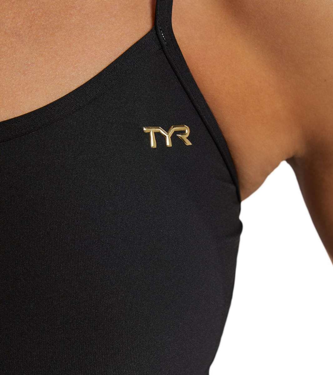 TYR Women's Trinityfit Torch Swimsuit - A black swimsuit with a gold logo on the upper left side of the chest area.