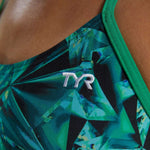 TYR Women's Crystalized Cutout Swimsuit - A green swimsuit with a geometric pattern and cutouts on the sides, featuring a crystal-like design.