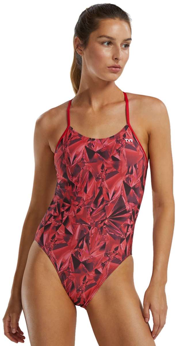 TYR Women's Crystalized Cutout Swimsuit - A red swimsuit with a geometric pattern and cutouts on the sides, featuring thin straps and a high-cut leg.