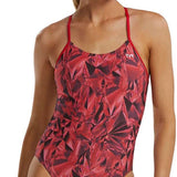 TYR Women's Crystalized Cutout Swimsuit - A red swimsuit with a geometric pattern and cutouts on the sides, featuring thin straps and a high-cut leg.