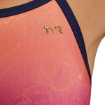 TYR Women's Diamondfit Infrared Swimsuit - A pink and orange ombre swimsuit with a diamond pattern on the torso.