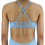 TYR Women's Lapped Trinityfit Swimsuit - A light blue swimsuit with a lapped design and thin straps.