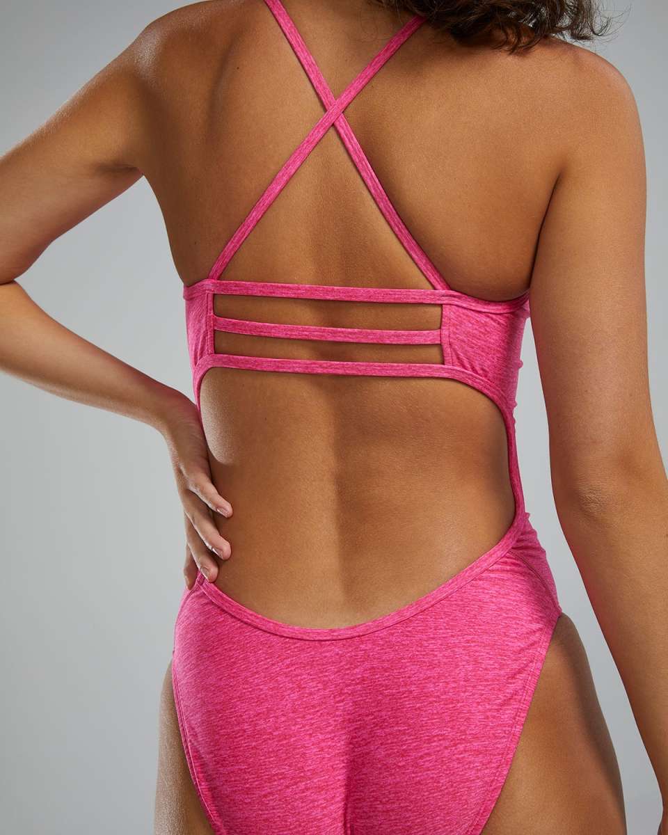 TYR Women's Lapped Trinityfit Swimsuit - A pink swimsuit with a lapped design and thin straps.