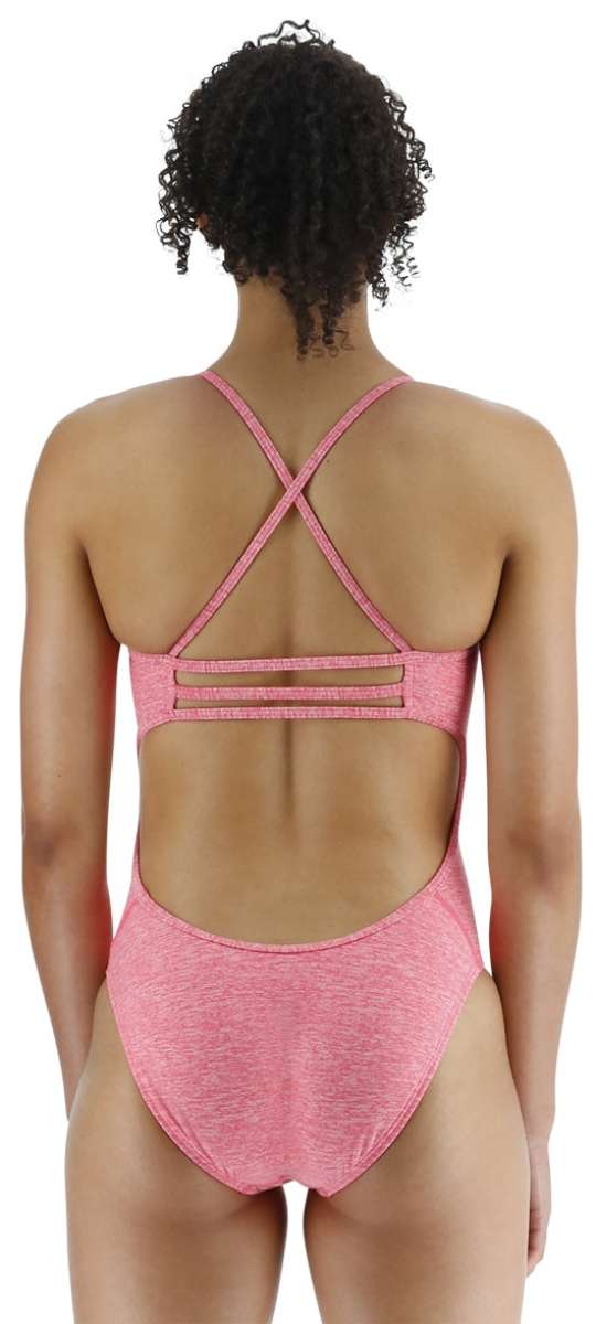 TYR Women's Lapped Trinityfit Swimsuit - A pink swimsuit with a lapped design and thin straps, worn by a model facing away from the camera.