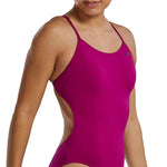 TYR Women's Solid Cutoutfit Swimsuit - A women's swimsuit with a solid pattern, featuring cutouts on the sides and back. The suit is primarily black in color.