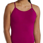 TYR Women's Solid Cutoutfit Swimsuit - A solid pink swimsuit with thin straps and a cut-out detail on the side.