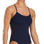 TYR Women's Solid Trinityfit One Piece Swimsuit - A navy blue one-piece swimsuit with thin straps and a high-cut leg.
