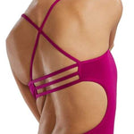 Trinityfit - A solid, one-piece swimsuit with a high neckline and thin straps. The suit is a deep purple color.