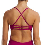 TYR Women's Solid Trinityfit One Piece Swimsuit - A solid, one-piece swimsuit with a high neckline and thin straps. The suit is primarily black in color.