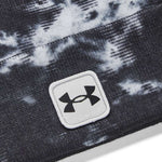 Under Armour - A black beanie with a white printed design featuring an abstract pattern of lines and shapes.
