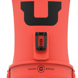 Union Women's Trilogy Snowboard Bindings 2023 - A coral-colored snowboard binding with a black logo on top and a textured strap.