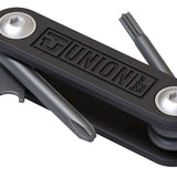 Union Pocket Tool - A black multi-tool with a small pocket clip on top, featuring a fold-out design and various tools including pliers, screwdrivers, and knives.