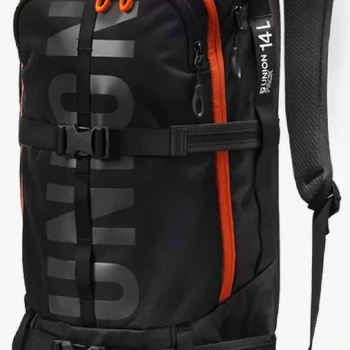 Union Resort Backpack 14L 2024 - Black backpack with orange zipper and straps, featuring a geometric pattern on the front panel.