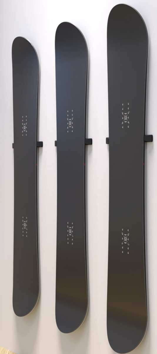 Union Snowboard Wall Mount 2023-2024 - A black metal wall mount with a minimalist design, featuring two horizontal bars and a small logo at the top.