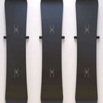 Union Snowboard Wall Mount 2023-2024 - Black metal wall mount with a minimalist design, featuring two horizontal bars and a small logo at the top.