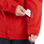 Volcom V.Co Op Shell Jacket 2024 - A red jacket with a white stripe across the chest and black zipper.