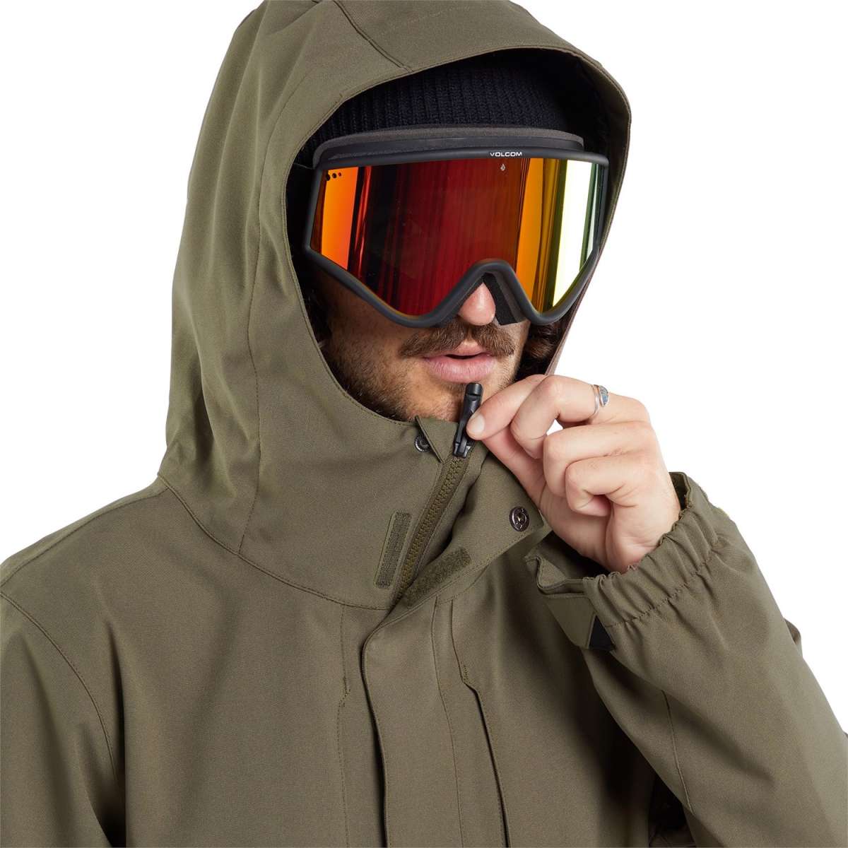 Volcom V.Co Op Shell Jacket 2024 - A dark green jacket with a hood, featuring black zippers and a black drawstring at the waist.