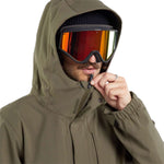 Volcom V.Co Op Shell Jacket 2024 - A dark green jacket with a hood, featuring black zippers and a black drawstring at the waist.