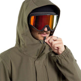Volcom V.Co Op Shell Jacket 2024 - A dark green jacket with a hood, featuring black zippers and a black drawstring at the waist.