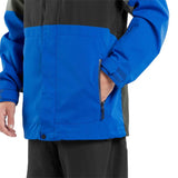 Volcom V.Co Op Shell Jacket 2024 - A blue jacket with a black stripe across the chest and two zippered pockets on either side.