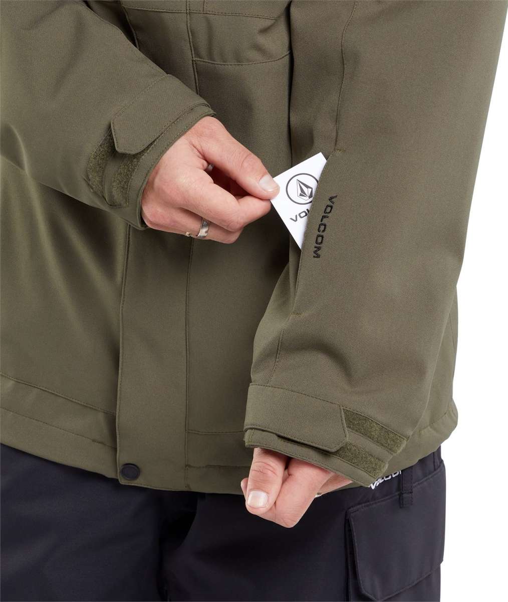 Volcom V.Co Op Shell Jacket 2024 - A green jacket with a black logo on the left chest and black Velcro straps at the wrists.