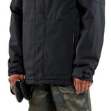 Volcom V.Co Op Shell Jacket 2024 - A black jacket with a hood, featuring a zippered front and two pockets on either side.