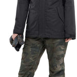 Volcom Women's Fawn Insulated Jacket - A black jacket with a fur-lined hood and quilted pattern on the chest.