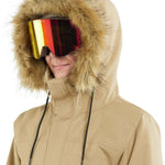 Volcom Women's Fawn Insulated Jacket - A tan jacket with a fur-lined hood and black drawstrings.