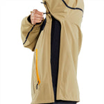Volcom Brighton Pullover Jacket 2024 - A tan-colored jacket with a black zipper and two zippered pockets on either side.